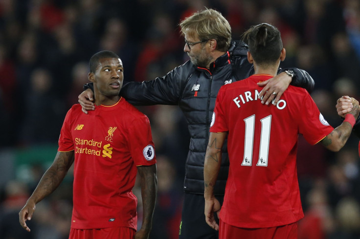Liverpool manager Jugen Klopp with Georginio Wijnaldum and Roberto Firmino