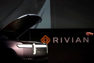 Rivian is the latest auto maker to cut jobs this year. In photo: Rivian CEO R.J. Scaringe introduces his company's R1T all-electric pickup truck at Los Angeles Auto Show in Los Angeles, California, U.S. November 27, 2018.