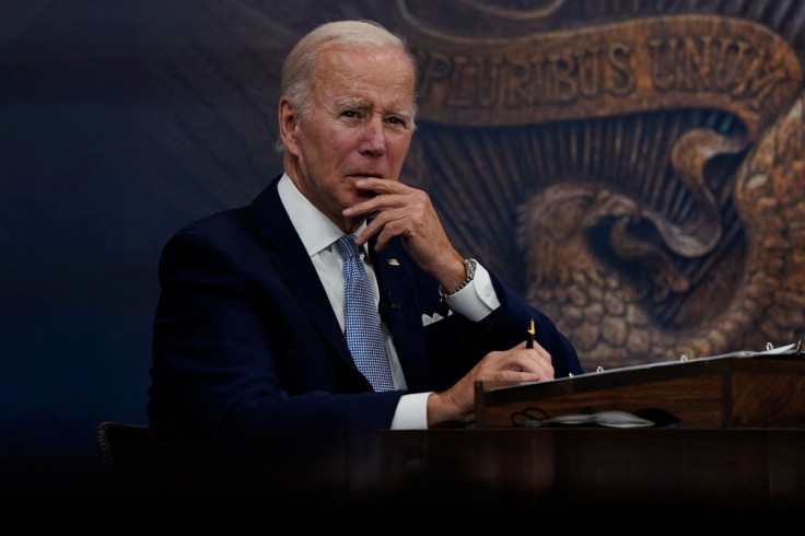 U.S. President Joe Biden listens as he receives an update on economic conditions from his advisors in the Eisenhower Executive Office Building's South Court Auditorium at the White House in Washington, U.S., July 28, 2022. 