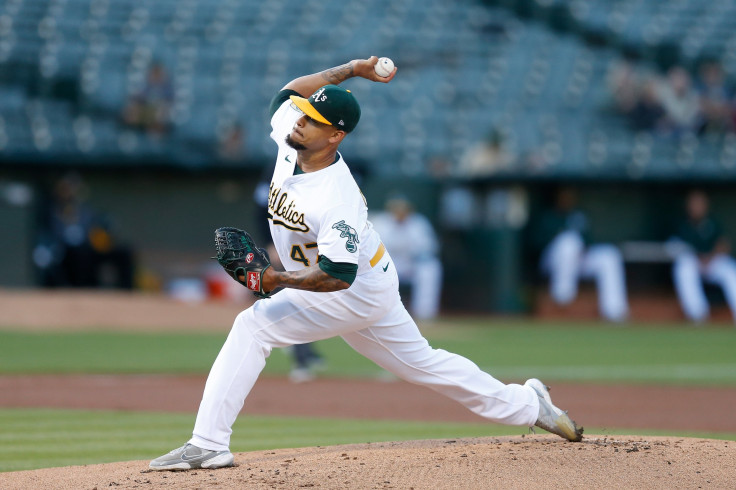 Frankie Montas #47 of the Oakland Athletics pitches in the top of the first inning against the Houston Astros at RingCentral Coliseum on July 26, 2022 in Oakland, California.