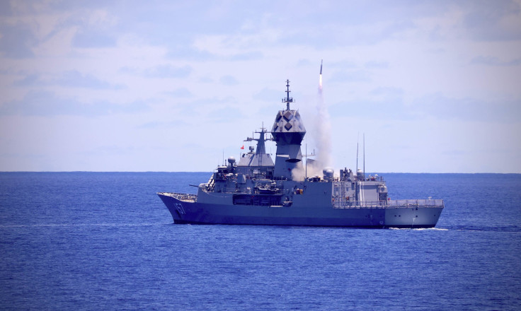 PHILIPPINE SEA - Royal Australian Navy Anzac-class frigate HMAS Perth (FFH 157) launches an SM-2 Standard Missile during a missile exercise conducted with Arleigh Burke-class guided-missile destroyer USS Barry (DDG 52) as part of Pacific Vanguard (PV) 22