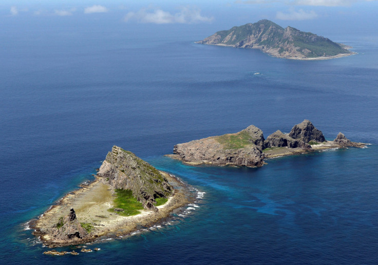 A group of disputed islands, Uotsuri island (top), Minamikojima (bottom) and Kitakojima, known as Senkaku in Japan and Diaoyu in China is seen in the East China Sea, in this photo taken by Kyodo, Sept. 2012.