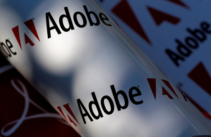 Adobe company logos are seen in this picture illustration taken in Vienna July 9, 2013.