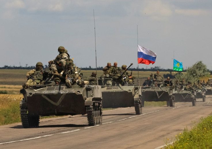 An armoured convoy of Russian troops drives in Russian-held part of Zaporizhzhia region, Ukraine, July 23, 2022.