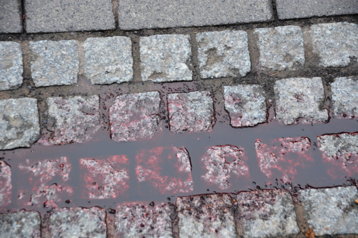 Blood on a pavement.