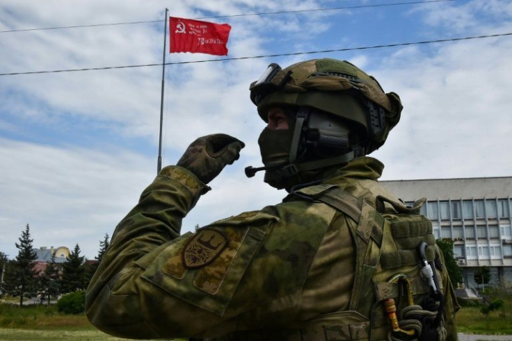 A Russian soldier on patrol in Kherson