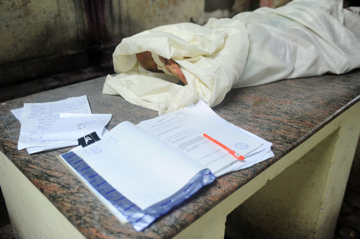 This picture shows a dead body at a morgue.