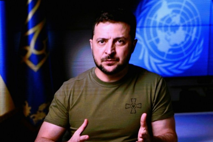 Ukrainian President Volodymyr Zelensky is seen on a screen as he remotely addresses the 77th session of the United Nations General Assembly on September 21, 2022