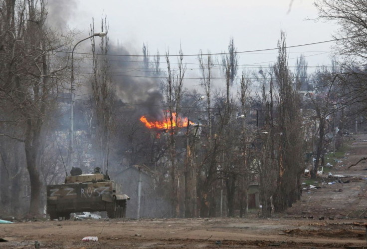 An armoured vehicle of pro-Russian troops is seen in the street during Ukraine-Russia conflict in the southern port city of Mariupol, Ukraine April 11, 2022.