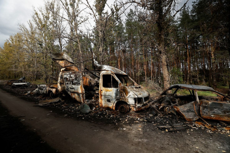 A view shows the hulks of blasted cars and a white van in which, according to Ukrainian military officers, last weekend a Russian army unit was speeding in retreat toward the eastern town of Lyman, as Russia's attack on Ukraine continues, outside the rece