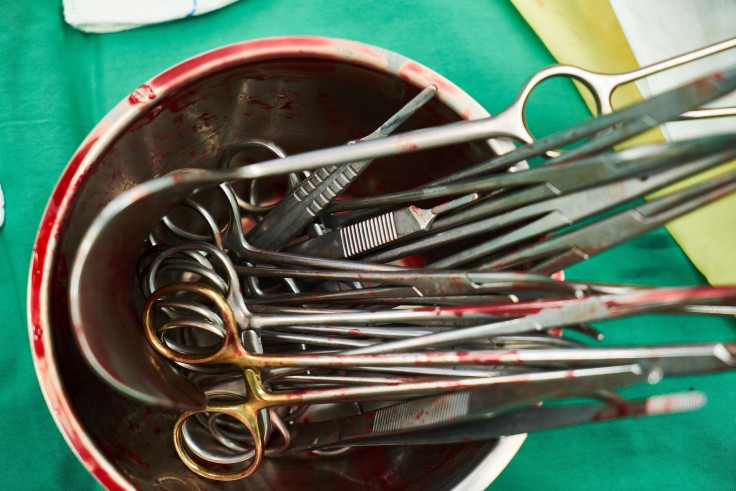 Representation. Bloodied surgery tools.