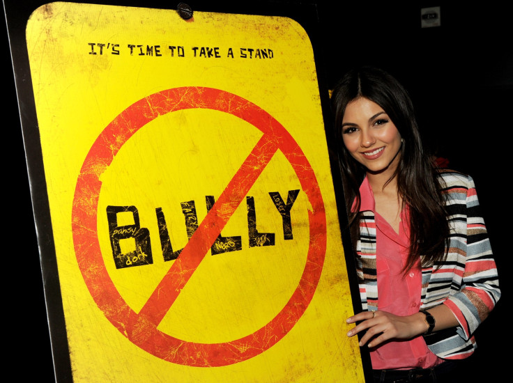In this photo, actress Victoria Justice arrives at the premiere of the Weinstein Company's 'Bully' at the Chinese 6 Theatres in Los Angeles, March 26, 2012.