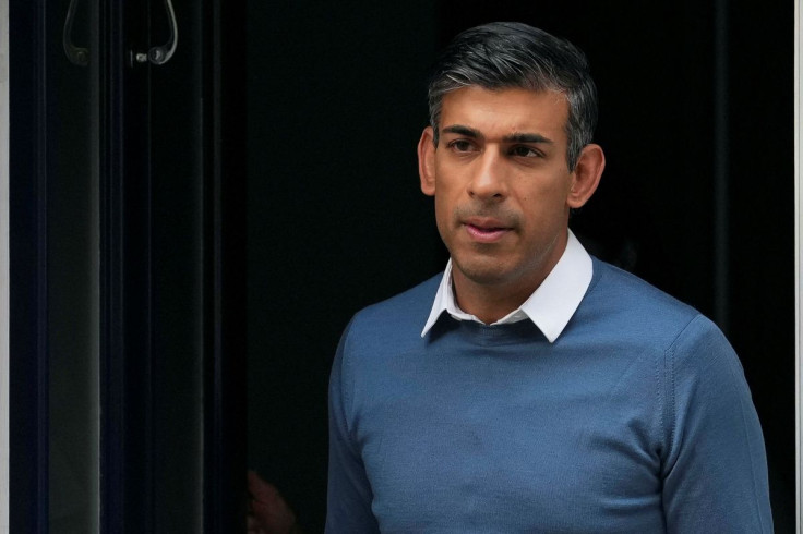 Conservative MP Rishi Sunak leaves his home address in London