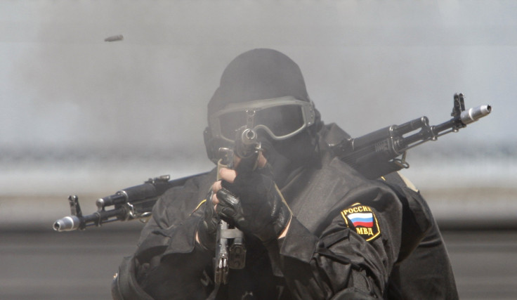 Newly inducted Russian soldiers of a special forces unit took part in a demonstration of skills during a ceremony after taking an oath in the Russian city of Stavropol, May 8, 2013.