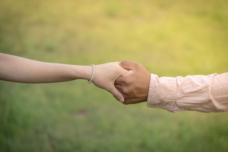 Representation. Holding hands.