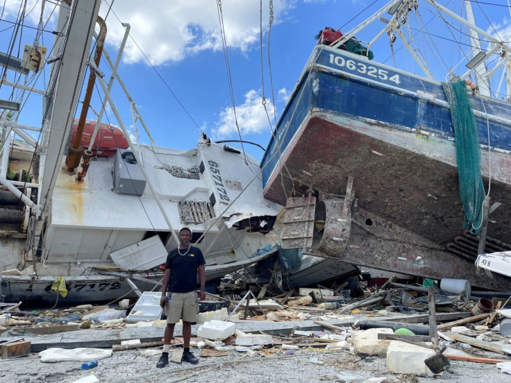 Hurricane Ian battered a shrimp boat tied on at a Fort Myers Beach dock