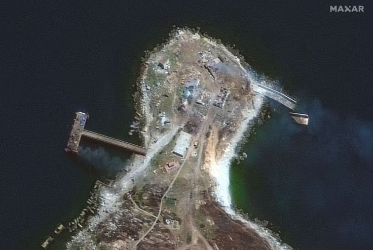 A satellite image shows a burning pier and buildings on the northern end of Snake Island, Ukraine, June 30, 2022. Maxar Technologies/via REUTER