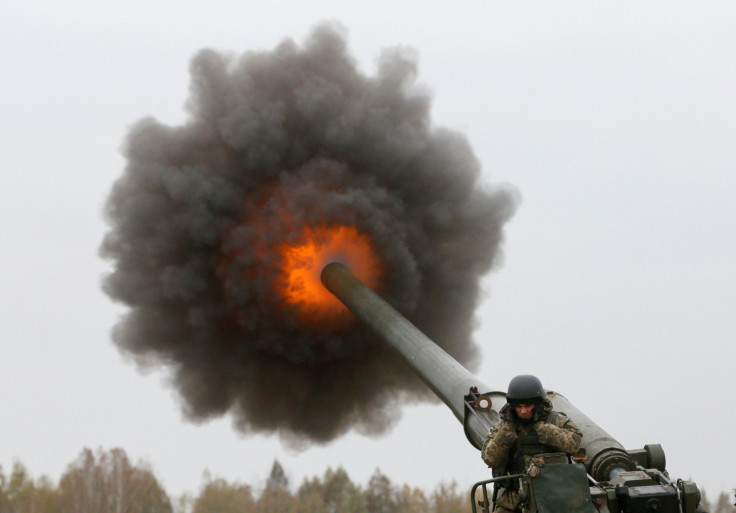 A Ukrainian serviceman fired a 2S7 Pion self-propelled gun during military exercises near the village of Divychky in Kiev region, Ukraine, Oct. 21, 2016.