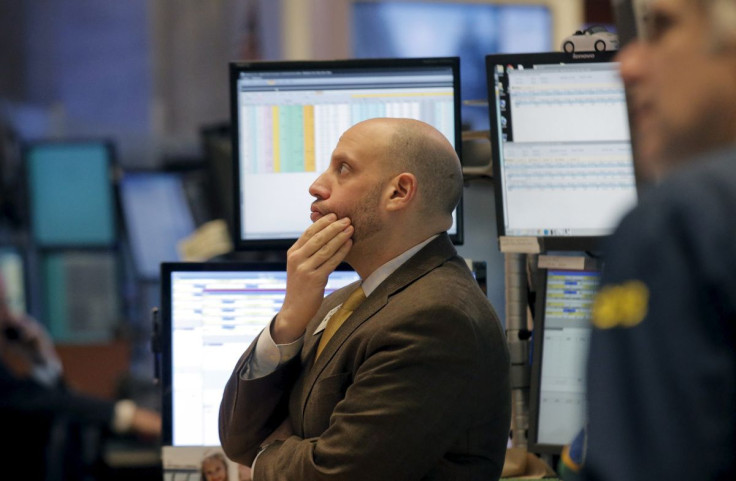 Traders work on the main trading floor of the New York Stock Exchange shortly after the opening bell of the trading session in New York