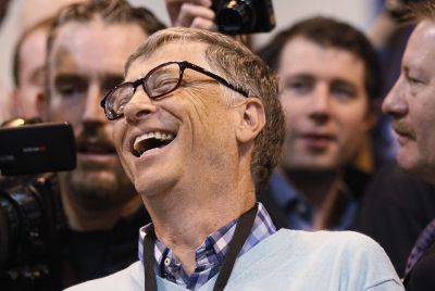 Microsoft founder and technology advisor Bill Gates laughs at a trade show during the Berkshire Hathaway annual meeting in Omaha.