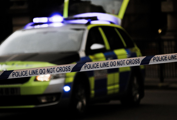 Representation. A police car at a crime scene.