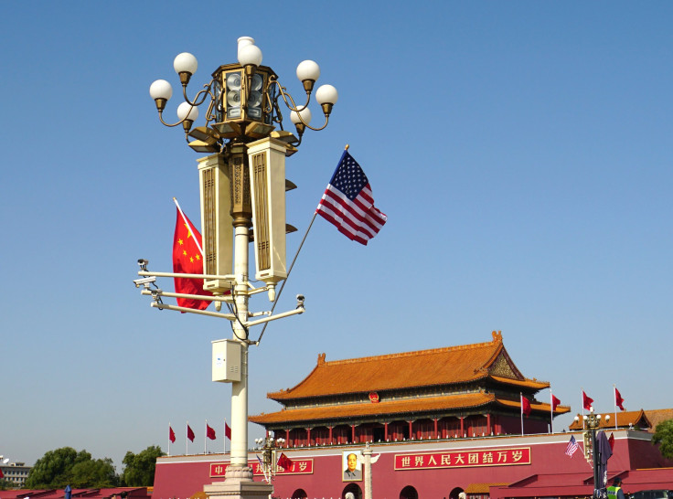 A file photo of Chinese and American national flags flying on Tian'anmen Square to welcome U.S. President Donald Trump on November 8, 2017 in Beijing, China.