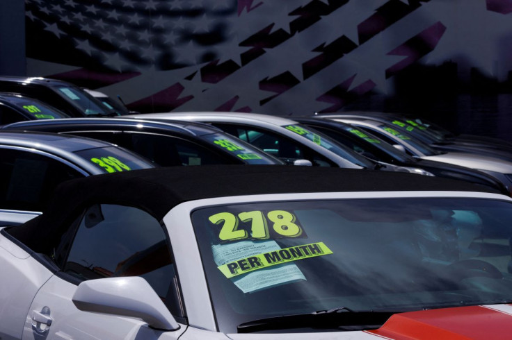 Cars are shown for sale at a car lot in California