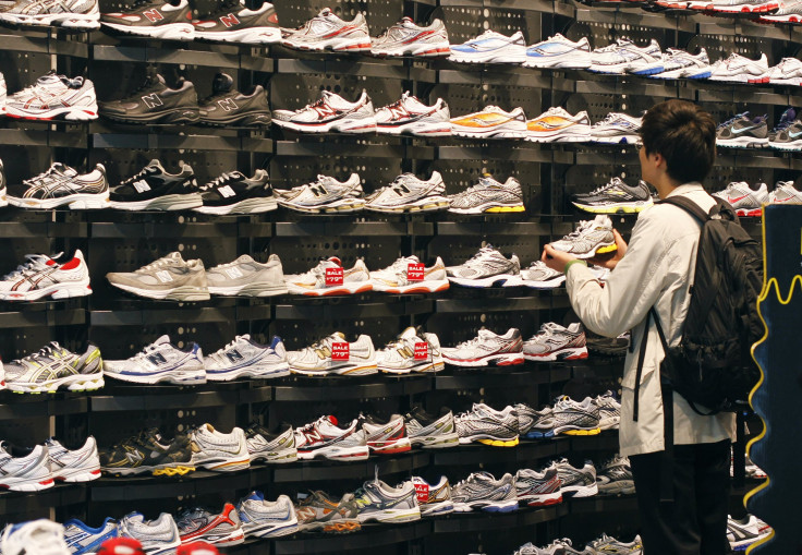 A man shops for shoes at a Foot Locker store in New York.