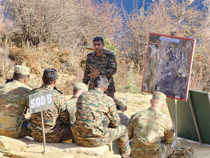 An Indian Soldier from 9th Assam Regiment explains HADR, humanitarian assistance and disaster relief, operations in a high-altitude environment during Exercise Yudh Abhyas 22 on November 28, Auli, India. Yudh Abhyas 22 is a bilateral training exercise aim