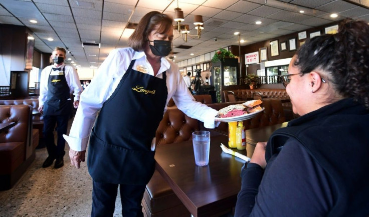 Nearly half the private job gains in June were in leisure and hospitality, reflecting business reopenings, according to the ADP report