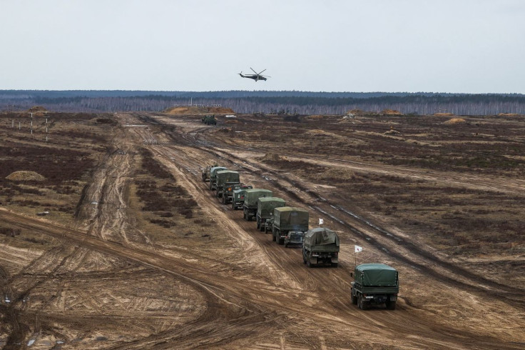 Representation. A helicopter flies over troops during the joint military drills of the armed forces of Russia and Belarus at a firing range in the Brest Region, Belarus.