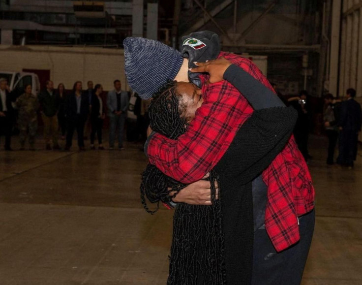 U.S. basketball star Brittney Griner embraces her wife Cherelle Griner following her release from prison in Russia, in an unknown location, on December 16, 2022.