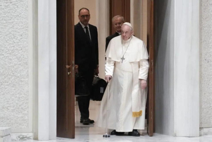 Pope Francis arrives for an audience with Vatican's employees in the Paul VI Hall, at the Vatican, Thursday, Dec. 22, 2022.