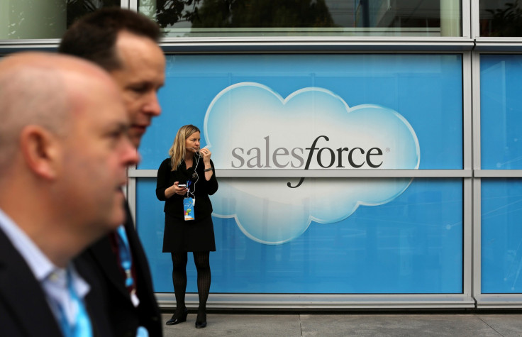 Salesforce has bought word processing startup Quip for $582 million. Here, a woman stands near a Salesforce sign during the company's annual Dreamforce event, in San Francisco, Nov. 18, 2013.