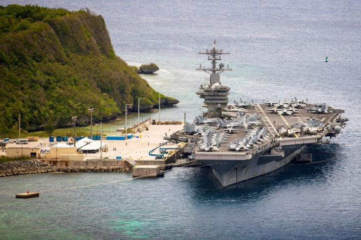 File picture of aircraft carrier USS Theodore Roosevelt moored at Naval Base Guam.