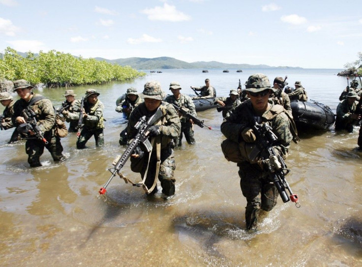 South China Sea disputes have intensified after soldiers from the Philippines and the United States partnered to conduct war games on the island of Palawan.
