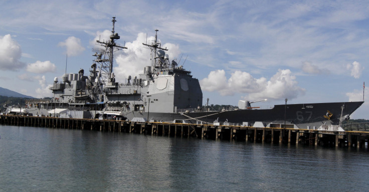 The Philippines announced that it would reopen a former U.S. naval base in order to expand its capabilities in the disputed South China Sea. In this photo, The USS Shiloh (CG-67), a U.S. Navy guided-missile cruiser, is docked at a port along Subic Bay, Za