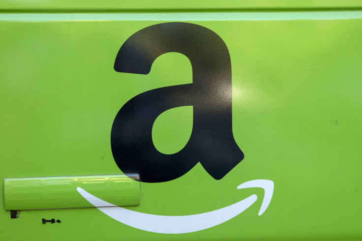 The Amazon.com Inc. logo is seen on the side of a delivery truck in Brooklyn, New York, Aug. 28, 2015.