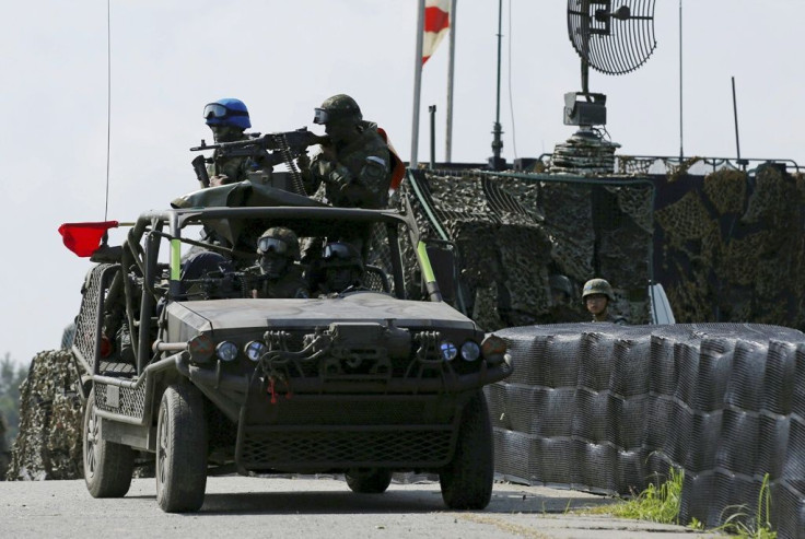 A military vehicle is seen during annual Han Kuang military drill simulating the China's People's Liberation Army invading the island, in Pingtung county, southern Taiwan, Aug. 25, 2016.