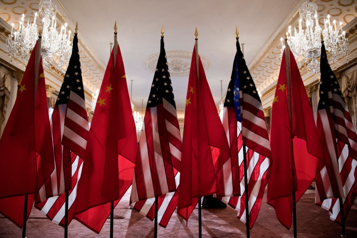 A file photo of US and Chinese flags seen as Secretary of State Mike Pompeo and China's Foreign Minister Wang Yi meet at the US Department of State May 23, 2018 in Washington, DC.
