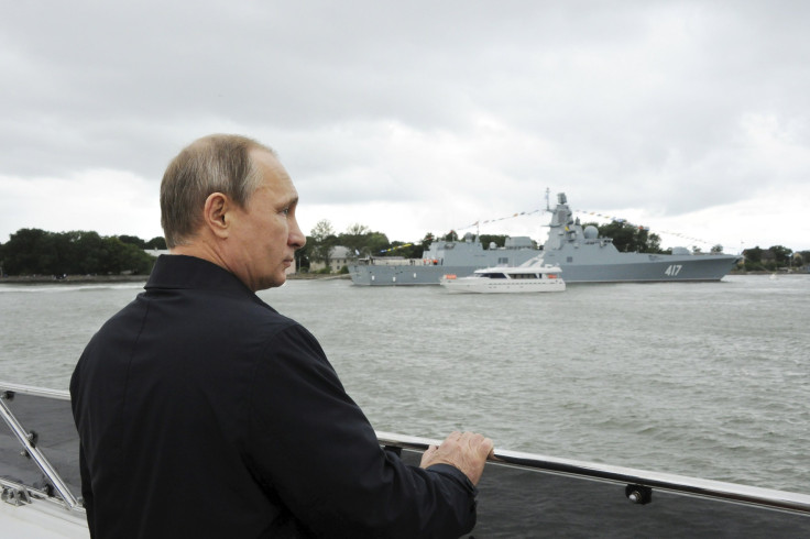China and Russia are planning on conducting the largest naval exercise between the two countries in history. Pictured: Russian President Vladimir Putin takes part in celebrations for Navy Day in Baltiysk, Kaliningrad region, Russia, July 26, 2015.