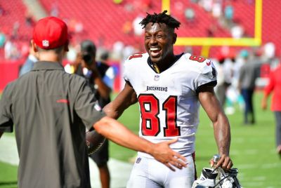 Tampa Bay's Antonio Brown celebrates after his record-setting day helped the Bucs to a 45-17 NFL victory over the Miami Dolphins
