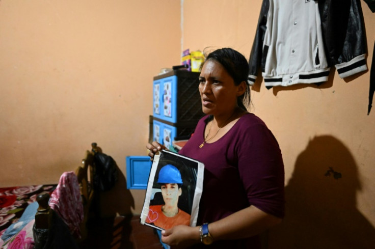 Irma Garcia with a picture of her son Isaias Galicia, just 17 when he was arrested