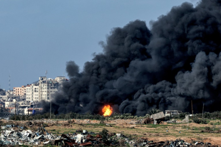 An explosion erupts as smoke rises in the Gaza Strip -- the UN Conference on Trade and Development (UNCTAD) said the territory 'currently is uninhabitable'
