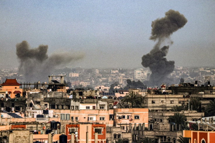 Smoke rises over buildings in Khan Yunis, the Gazan city that has been the recent focus of Israeli army operations