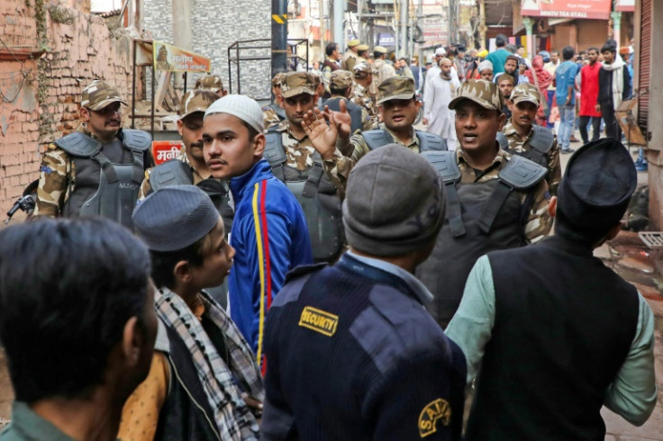 Security personnel patrol along a street near the Gyanvapi mosque in Varanasi. This week a local court ordering the mosque's basement thrown open to Hindu worshippers
