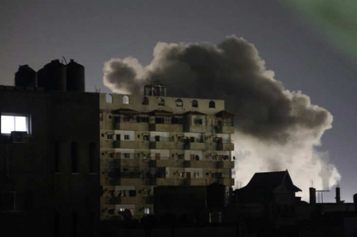 Smoke rises over buildings in Rafah amid Israeli bombardment as fighting continues between Israel Hamas