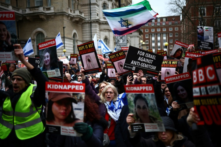 Protesters take part in a demonstration in London to bring attention to the Israeli women and girls who have been held by Hamas for over 110 days