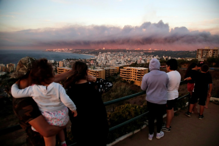 The fires have enveloped Valparaiso in a thick mushroom cloud of smoke