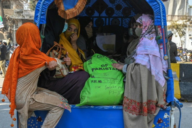 Voting materials are taken by truck from a distribution centre in Peshawar